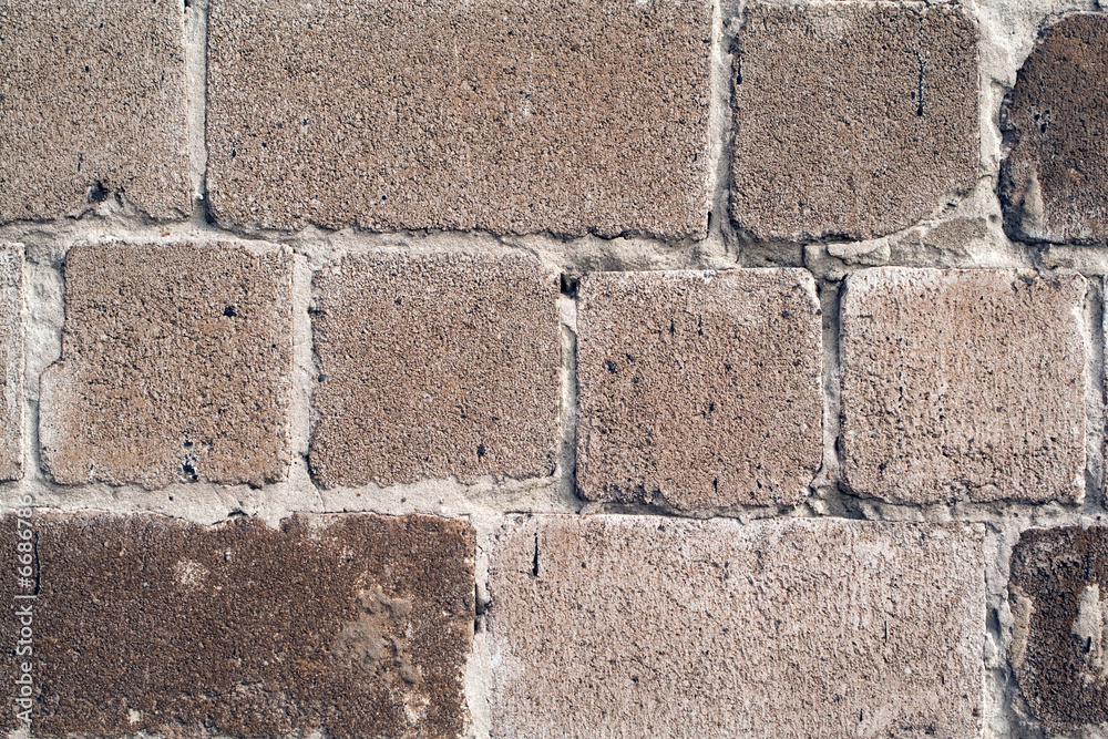 Obraz premium old wall from a rough grey brick. background 2