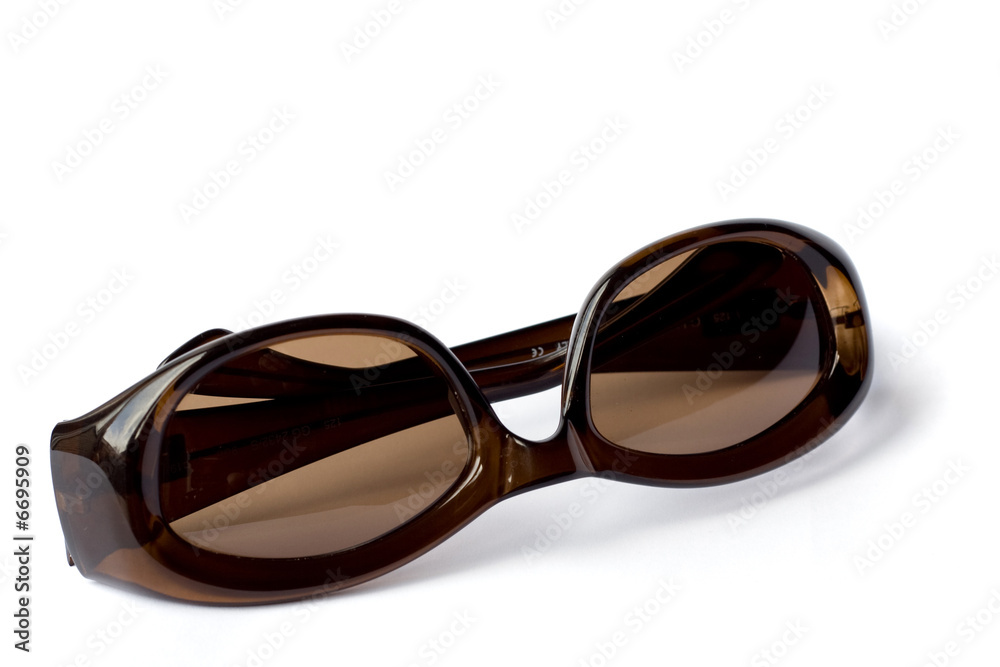 Dark sunglasses on white background upside down Dark sunglasses on white background upside down