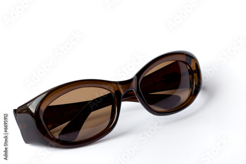 Dark sunglasses on white background
