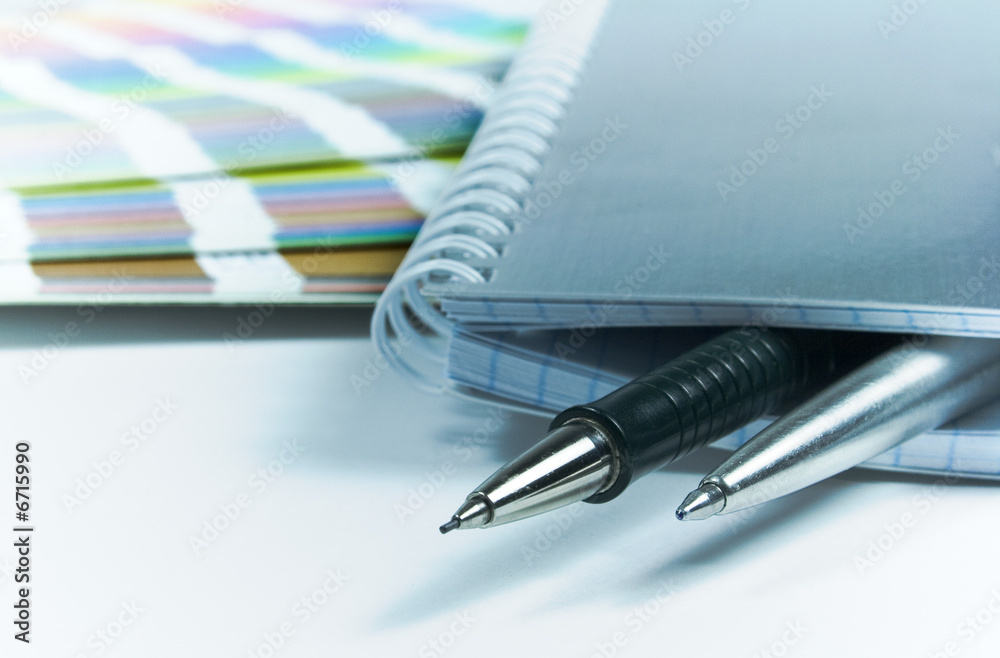 Fototapeta premium blank notebook, pens, color guide