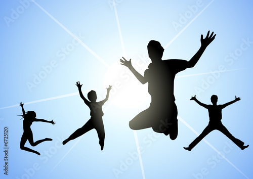 Happy people jumping in the sky