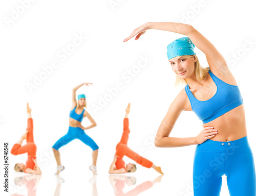 Group of women doing fitness exercise isolated on white