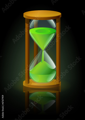 Sablier vert avec reflet sur fond noir