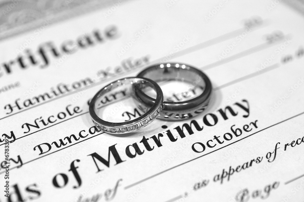 Fototapeta premium Rings and Marriage Certificate