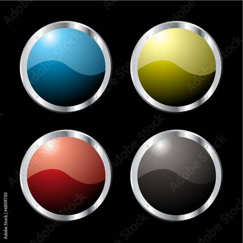 Collection of four buttons in various colors with a bevel