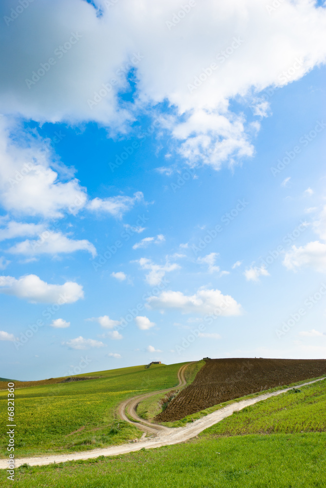 Fototapeta premium cloudscape for country road