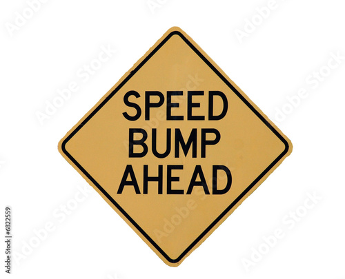 Speed bump ahead sign