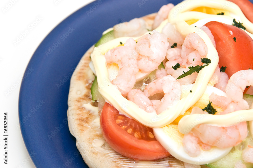 Tasty shrimp sandwich on blue plate isolated on white