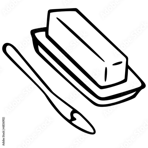 butter in a dish with a knife
