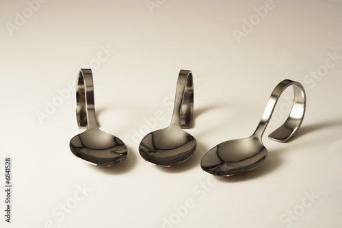 Three party spoons in a row