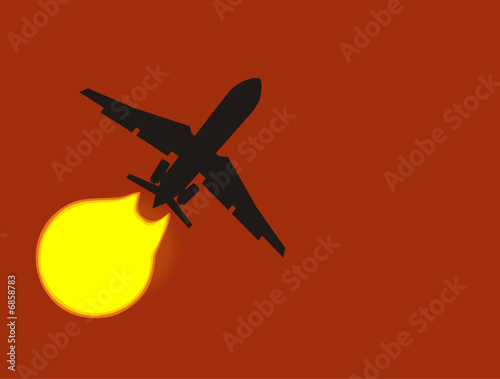 Silhouette of a aeroplane passing sun