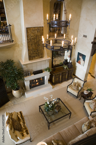 Living room with a fireplace and stylish decor.
