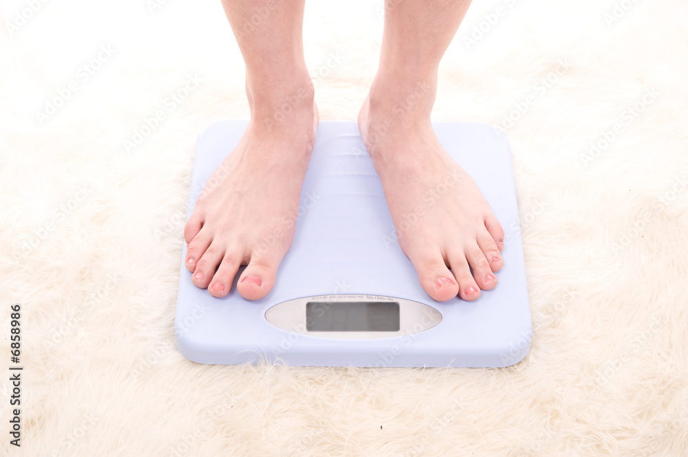 Fototapeta premium Feet on scales