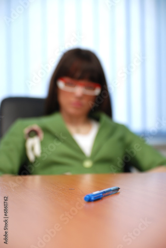 young businesswoman signing a contract photo