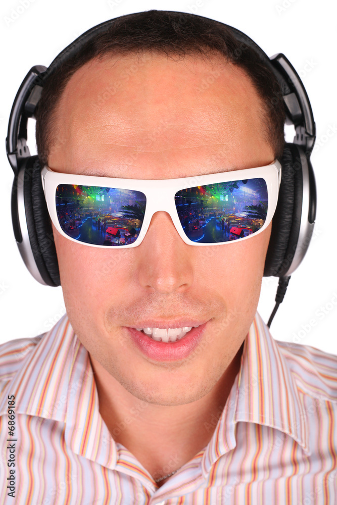 Young man with sunglasses and headphones Young man with sunglasses and headphones