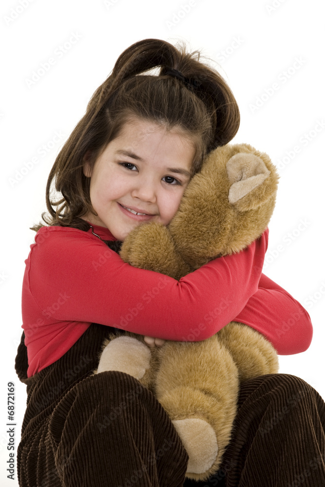 Child holding teddy bear Child holding teddy bear