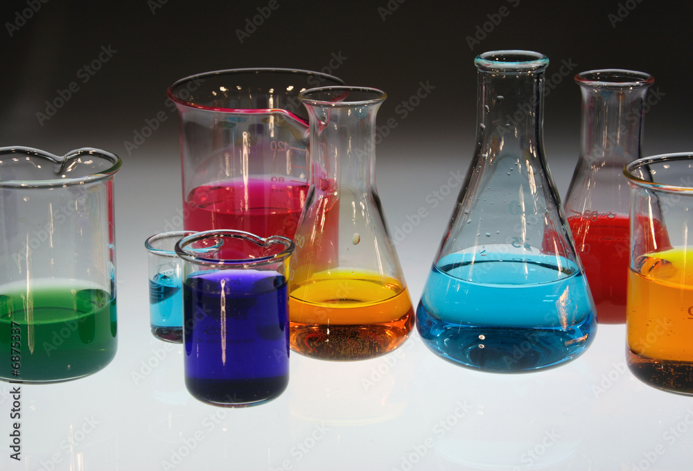 Beaker and conical flask with various colored sample Stock Photo