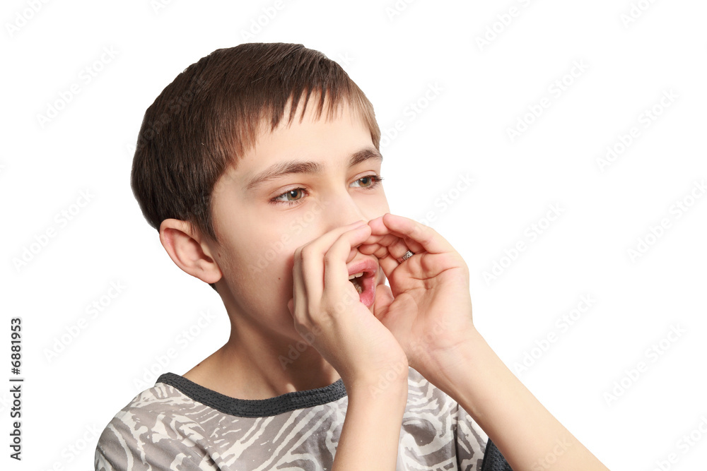 The teenager shouts in the megaphone combined from hands The teenager shouts in the megaphone combined from hands
