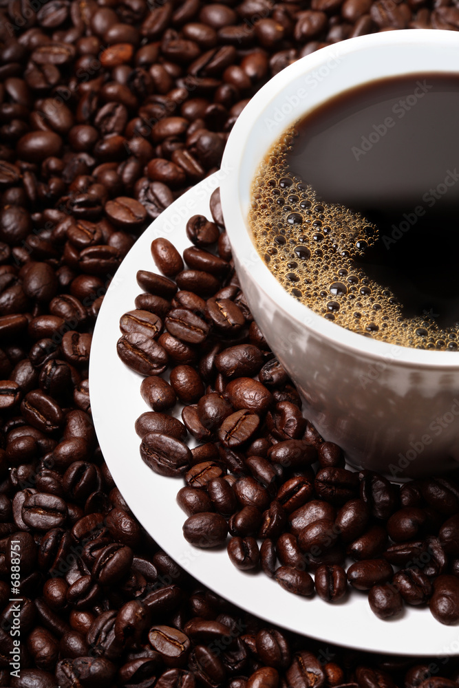 Fototapeta premium cup of coffee and coffee beans