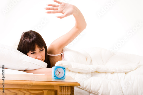 Slapping the anoying alarmclock photo