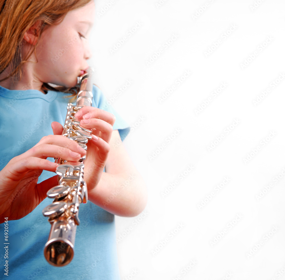 Fototapeta premium Young Girl Playing Flute