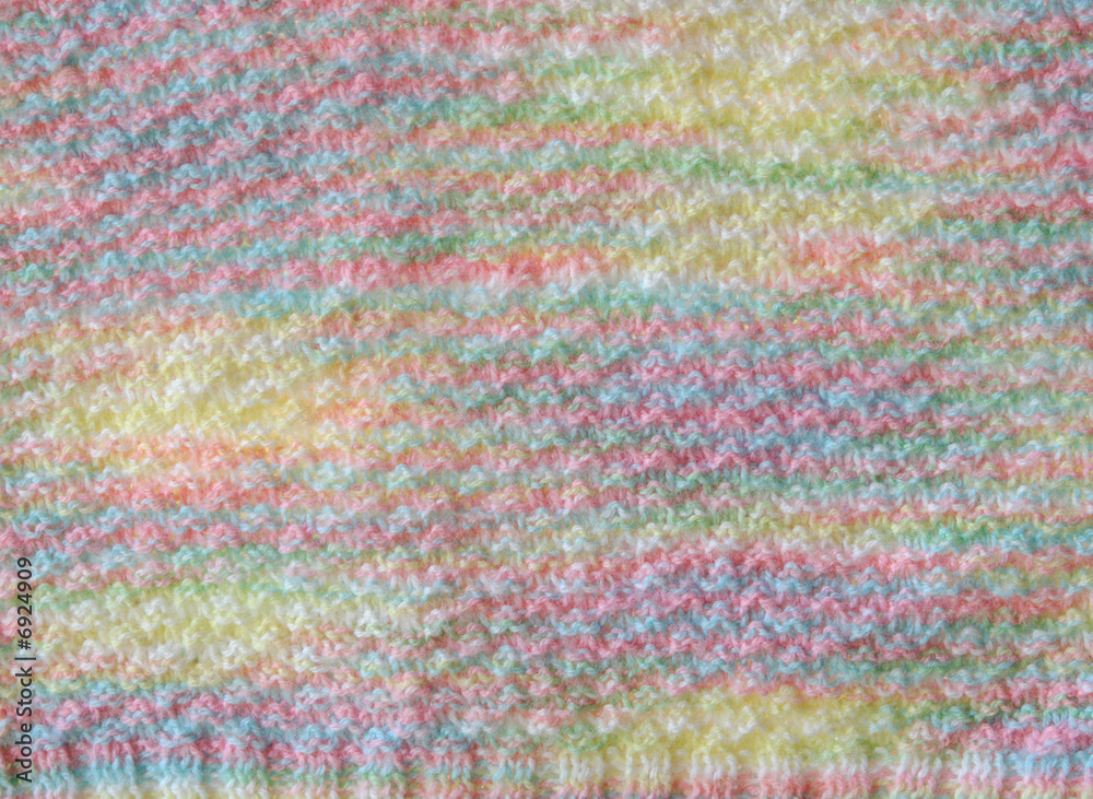soft hand-knit baby sweater background soft hand-knit baby sweater background