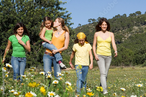 happy healthy group of kids walking outdoors