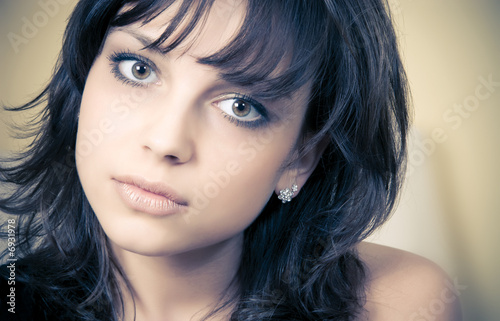 Young brunette woman concept portrait