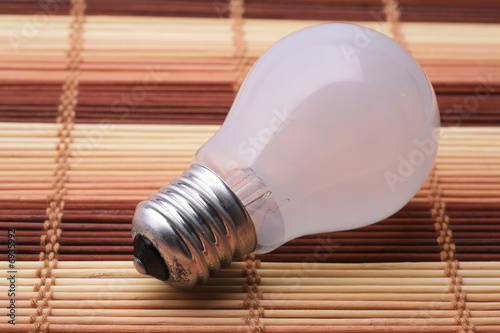 Fotografie Bulb with an incandescent filament and a matte flask