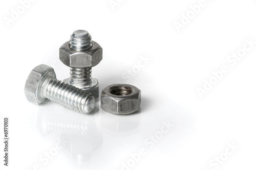 Two bolts and nuts on a white background