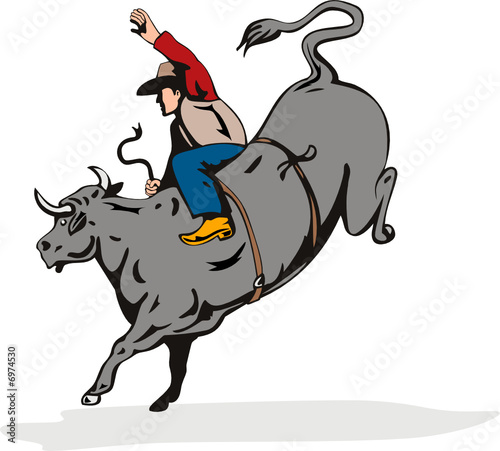 Cowboy riding a bull