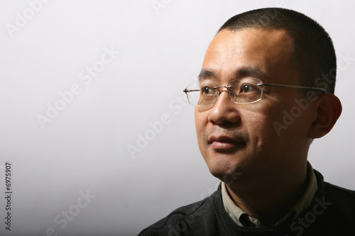 Фотография portrait of asian mid-adult man