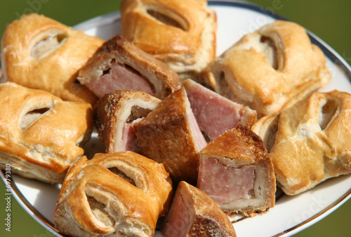 Pork pie and sausage rolls photo