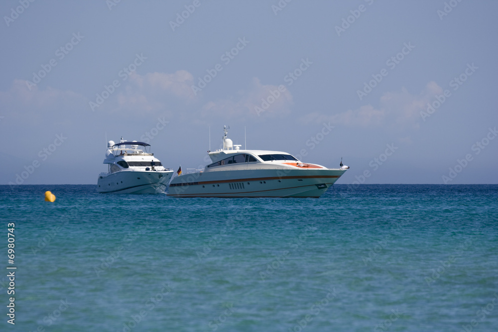 two speedboats at anchor