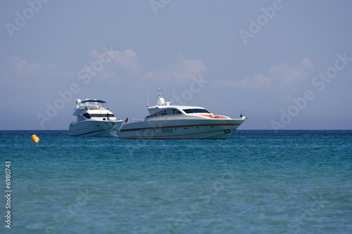 two speedboats at anchor