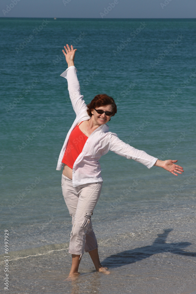 Obraz premium Girl on the Beach