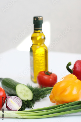 Fototapeta Naklejka Na Ścianę i Meble -  Multi-coloured vegetables for salad on a white background