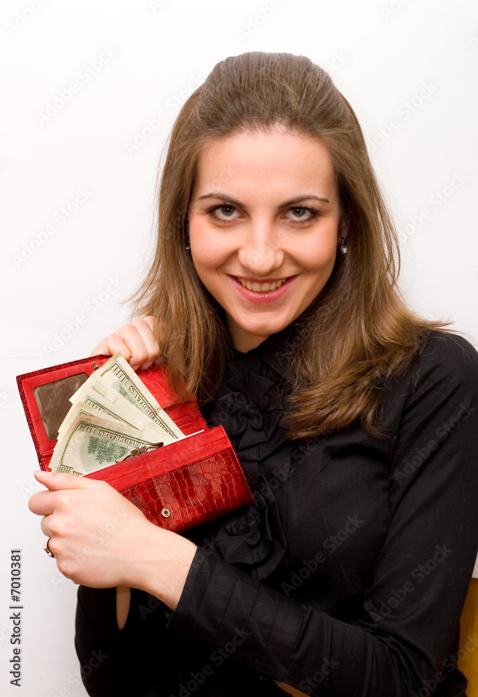 Beautiful business woman holding money and smiling.. Beautiful business woman holding money and smiling..