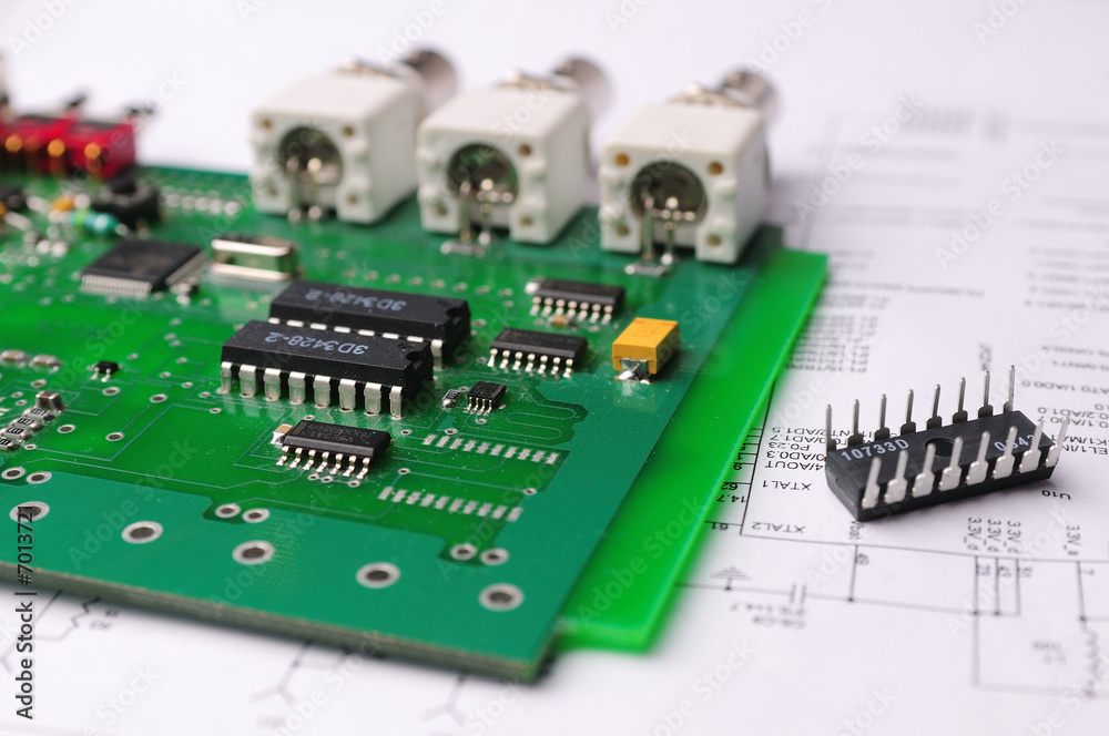 Close-up on a microchip on a scheme background
