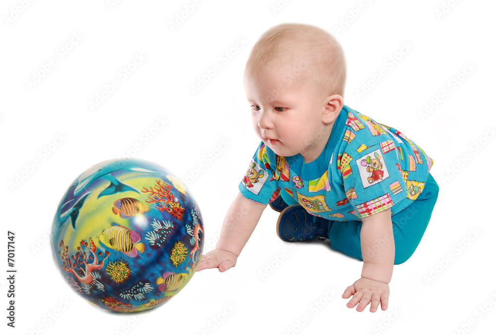 The kid plays with an inflatable ball The kid plays with an inflatable ball