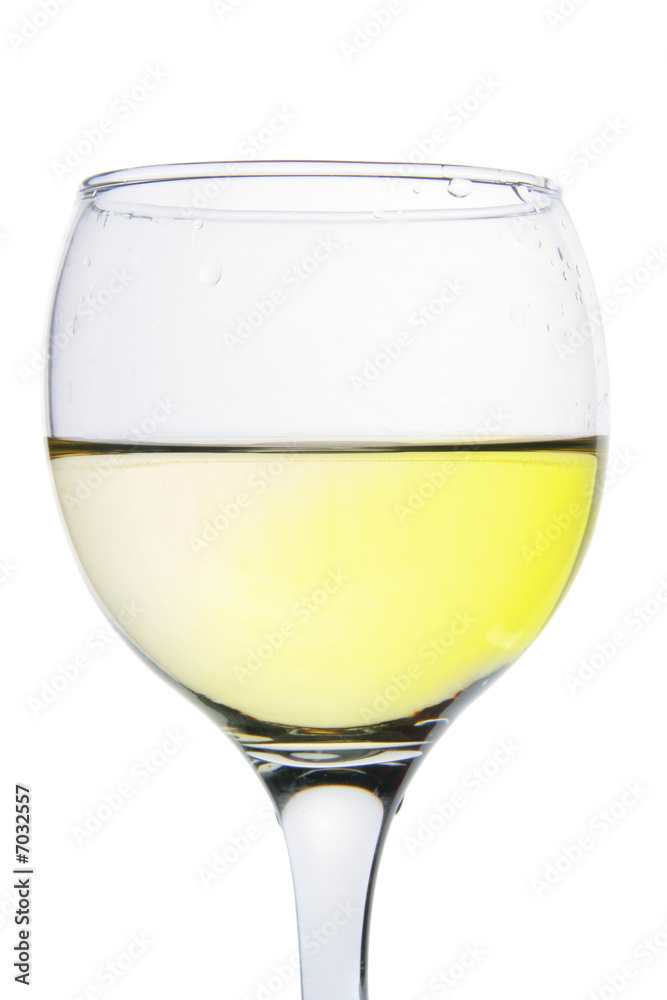 Glass with yellow drink