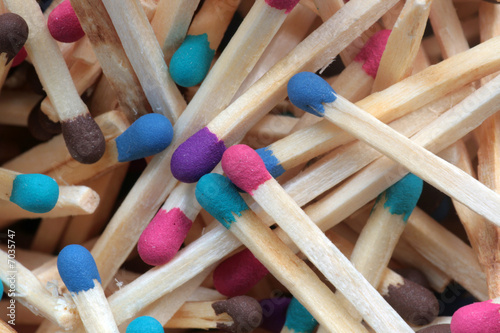 Wooden matches of different colors.