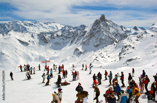 People skiing high in the Alps