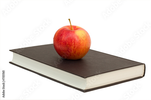 red apple on book