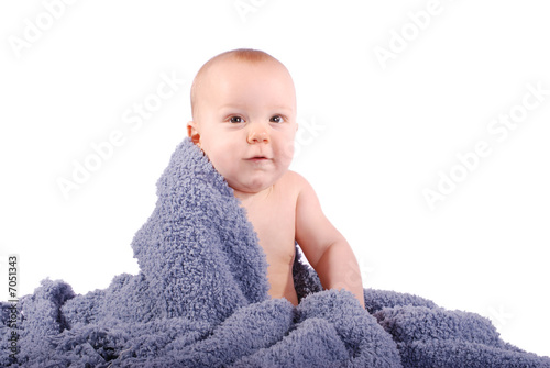 Cute Baby Wrapped in a Soft Blue Blanket on White Background