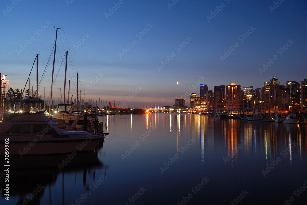 downtown vancouver at dawn with crescent moon