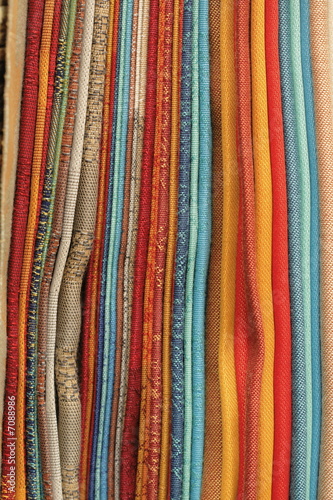 multy colored samples of fabric to serve as background © Lykovata