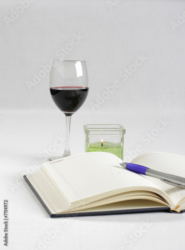 book, pen and wine