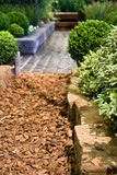 Pathway with stone and topsoil in calm garden