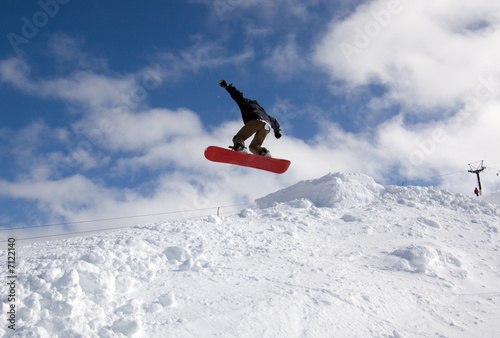 Snowboarder Jumping Mid-Air